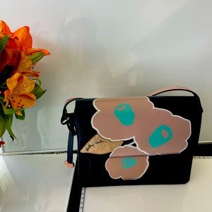 PreOwned.  Radley cross body bag. Inside is fully lined with a zipped pocket..